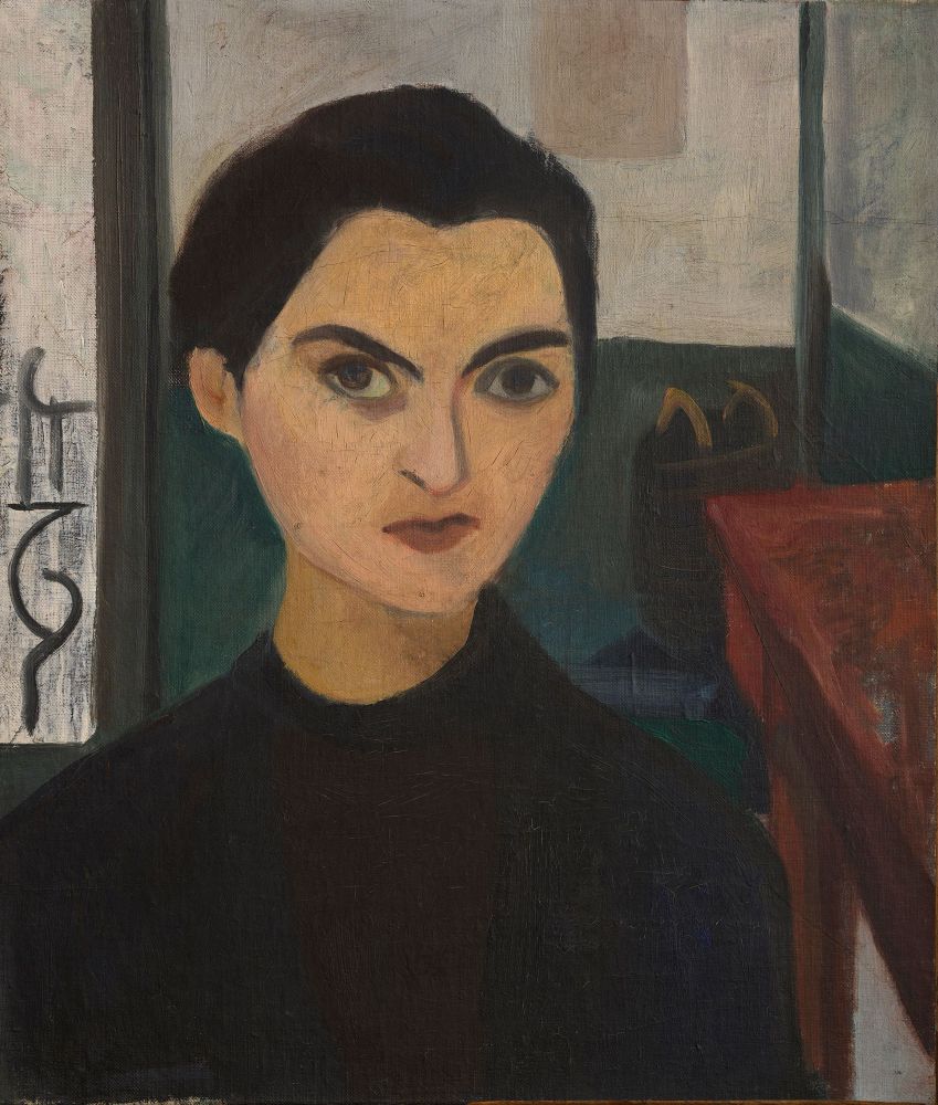 Torso and head of a figure in a Parisian interior.