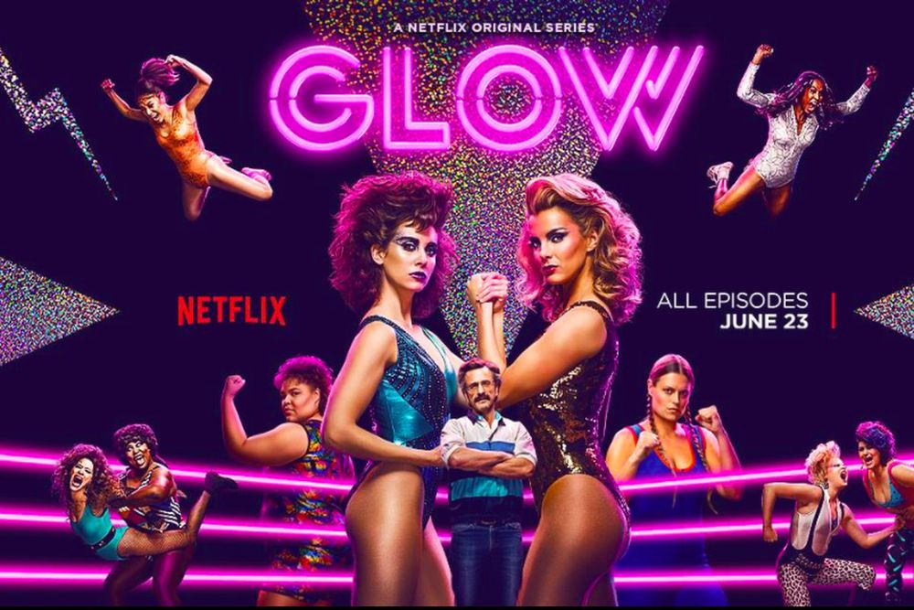 A promo image for GLOW, a Netflix show about women's wrestling in the 80s, starring Alison Brie and Betty Gilpin as well as about a million other fantastic people