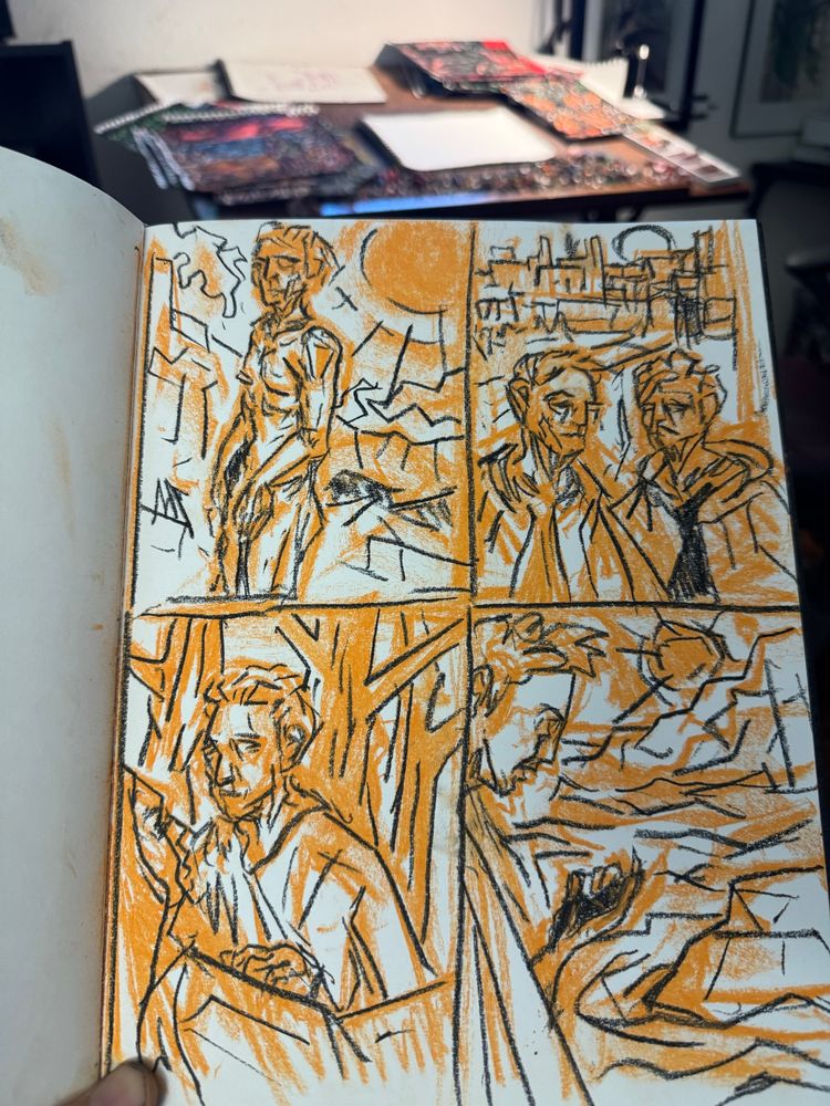 A hand holds open a hardbound sketchbook- inside, is a page with four small thumbnail sketches of figures engaged in different pursuits. The sketches are done with conte crayon. Art by Jason Thomas Pitzl. 