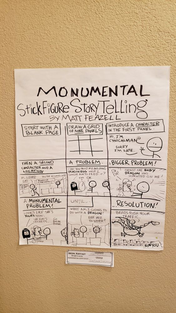 Art of "Monumental Stick Figure Storytelling" by Matt Feazell on a hotel wall. 