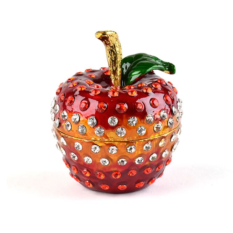 An image of a bejeweled apple, taken from https://www.therussianstore.com/products/teacher-gift-jeweled-apple-trinket-box