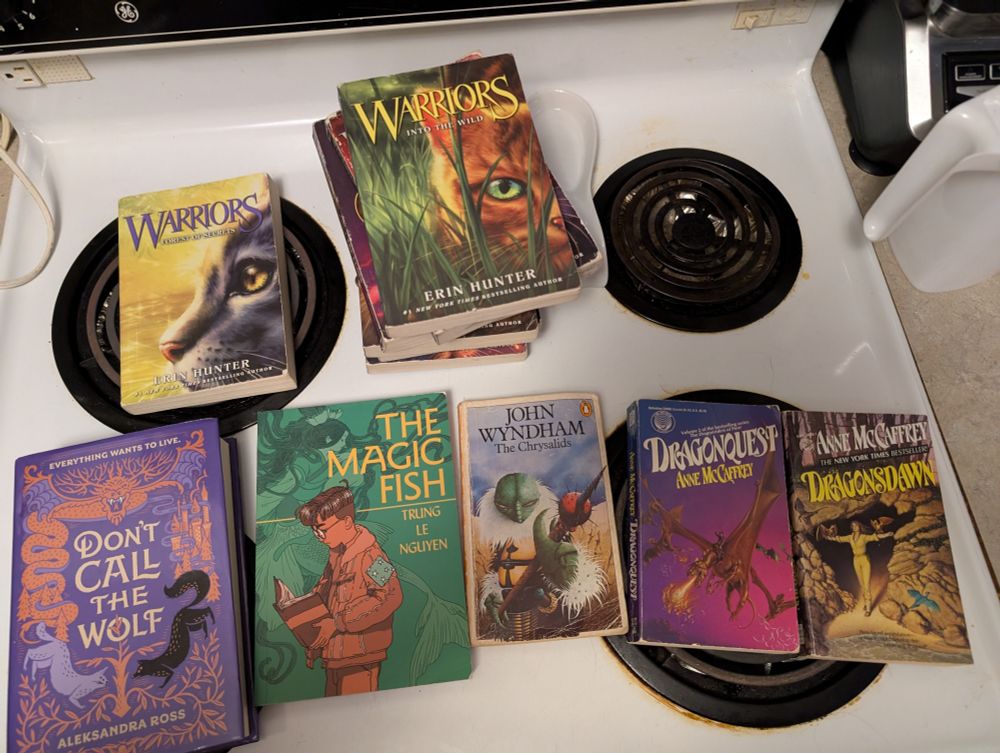 Warrior cats books, don't call the wolf, the magic fish, the crysalids, dragon quest, dragonsdawn