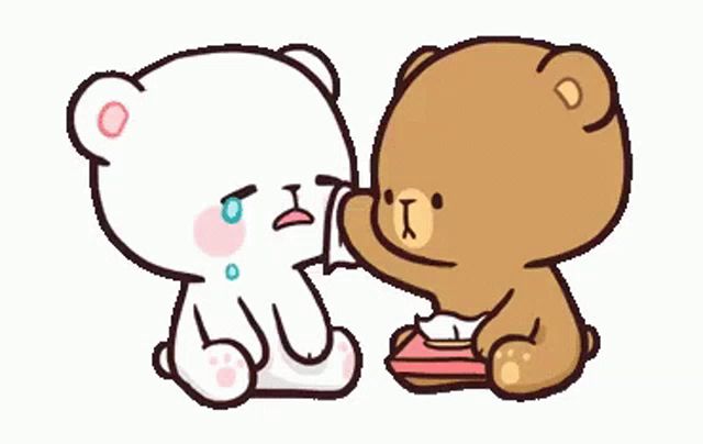 a couple of teddy bears are sitting next to each other and one of them is holding a tissue .