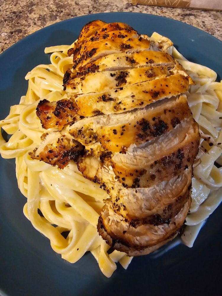 Fettuccine Alfredo with lemon pepper chicken