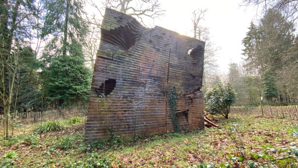 The Termite Pavilion, collapsing and covered in moss