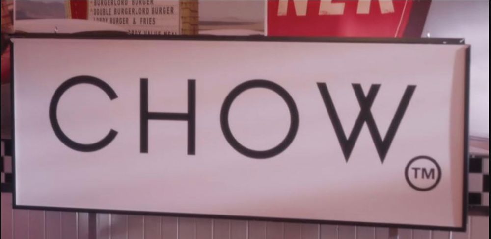 "Chow(TM)" sign from Famine's restaurant in the Good Omens TV series.