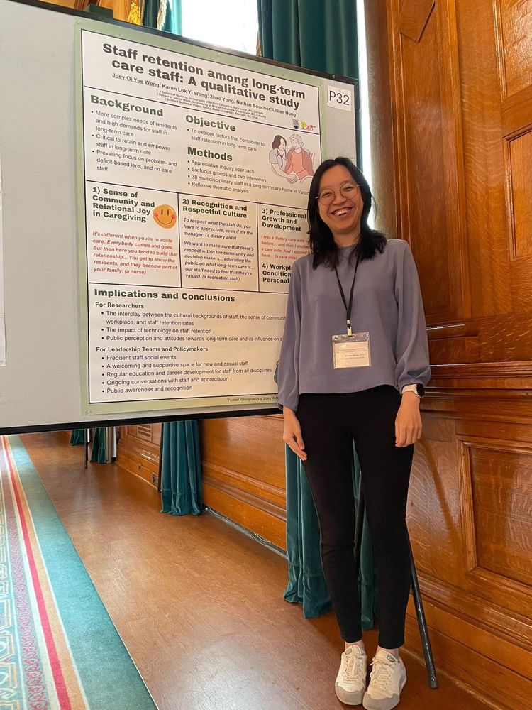 Joey Wong stands smiling beside a large academic poster titled “Staff retention among long-term care staff: A qualitative study” at the CGNA 2025 conference. The poster summarizes key themes like relational joy in caregiving, respectful workplace culture, and opportunities for professional growth.