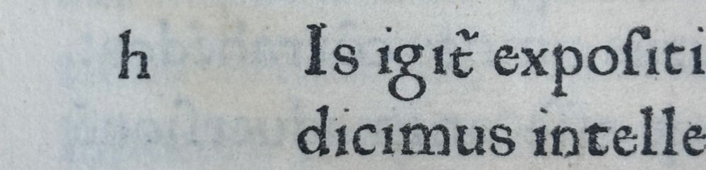 Detail of text from Cicero. De officiis. Of particular note is the lowercase “g” with its two round bowls connected by a nearly centered stroke. Bonus = to the left, in the margin, is a lowercase “h” with a straight arm instead of a curved uncial arm.