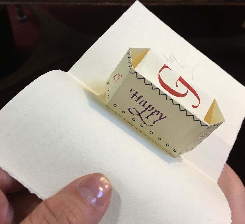Another side of pop up card that says “Happy” and a capital G
