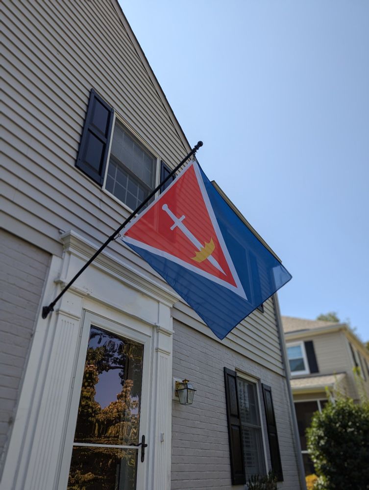Alternate flag design for Virginia flying off a house.