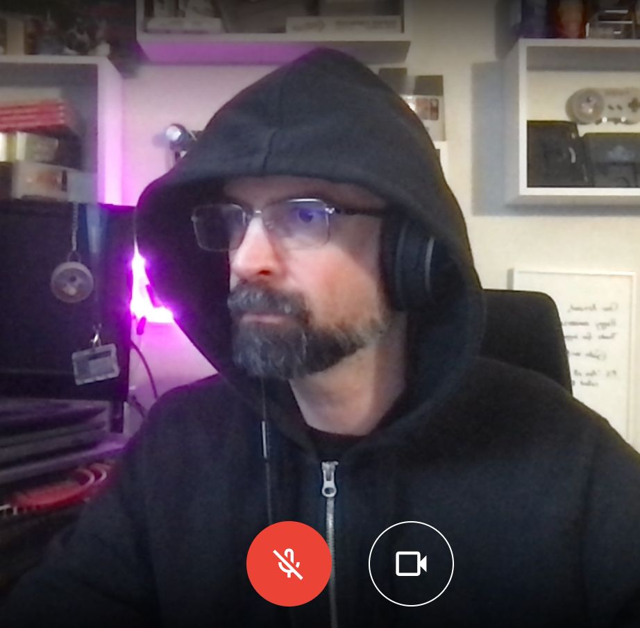 Screenshot of me in a call, wearing a black hoodie