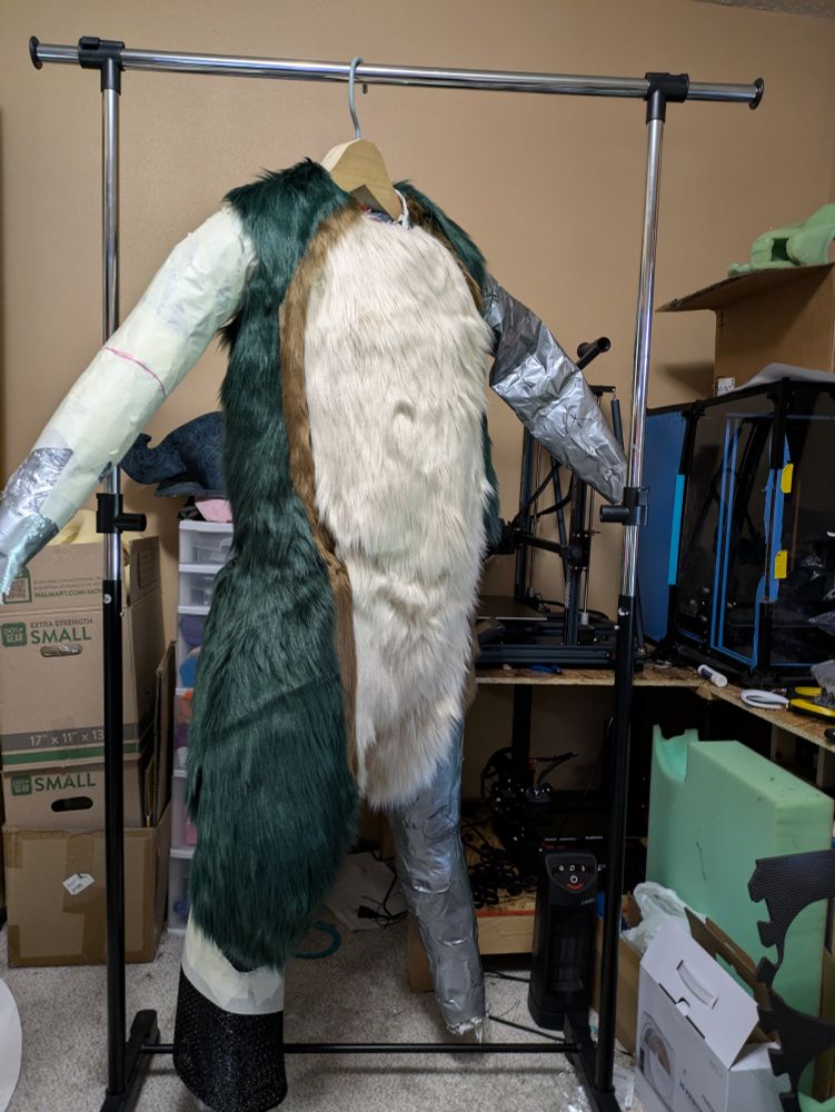 Fur piece cut and pinned to a DTD for a fursuit