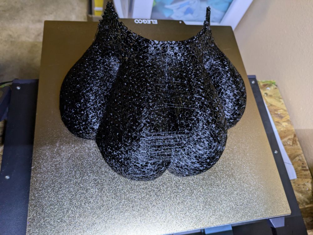 3D printed TPU toes for a Fursuit footpaw finished on printer bed