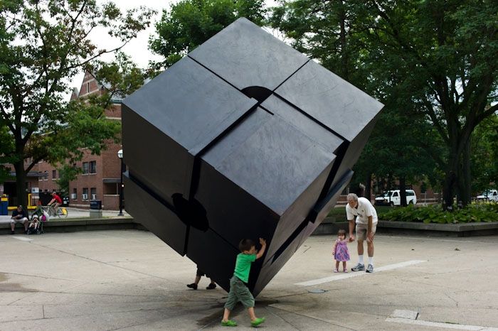 The Cube in Ann Arbor, Michigan, being spun by some children 