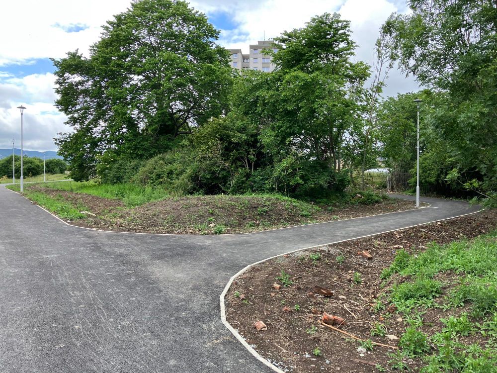 Looking back at new side path towards back of tower blocks near Greengables Nursery School