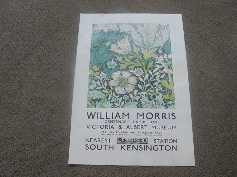 A poster advertising the Centenary Exhibition of William Morris at the V&A. The image is a wild stylised pattern of flowers and leaves.