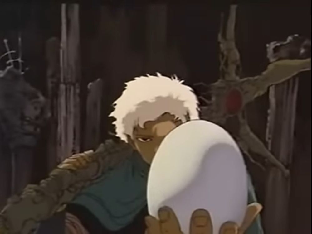 Now the soldier is holding out the egg.