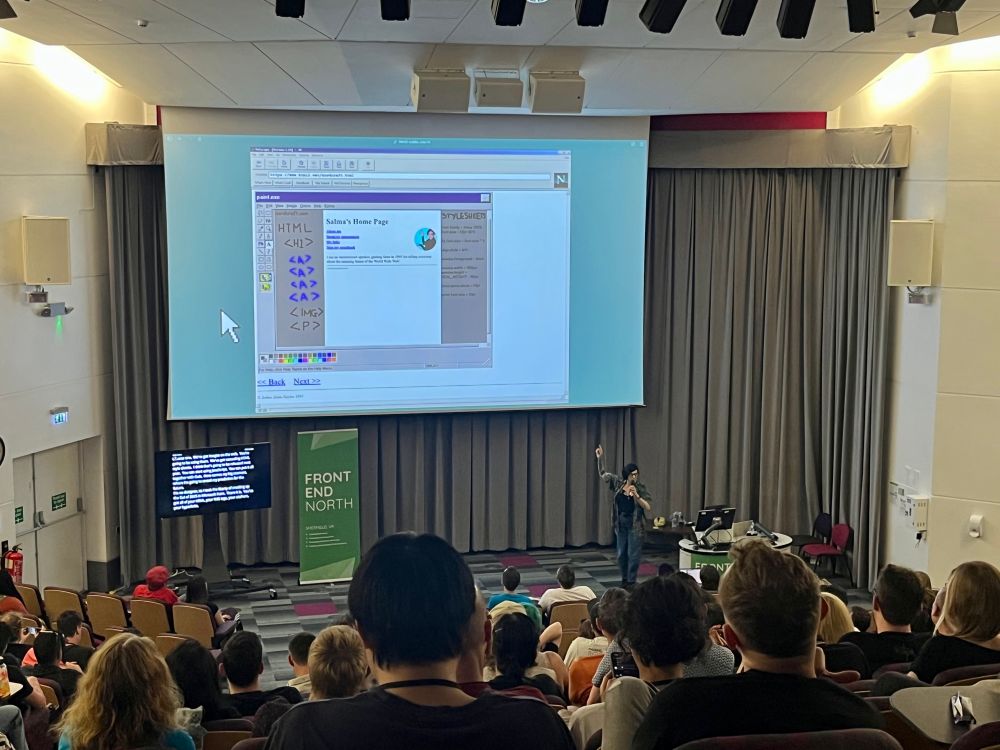 Salma pointing to the screen: A super interactive personal home page 