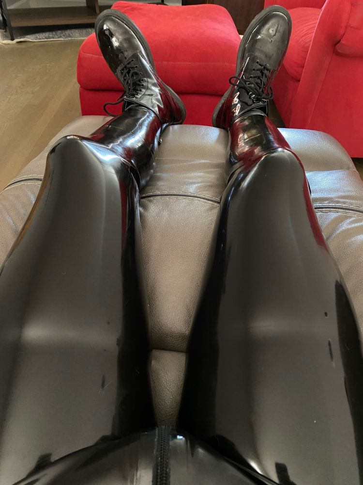 Latex leggings and patent doc martens on couch