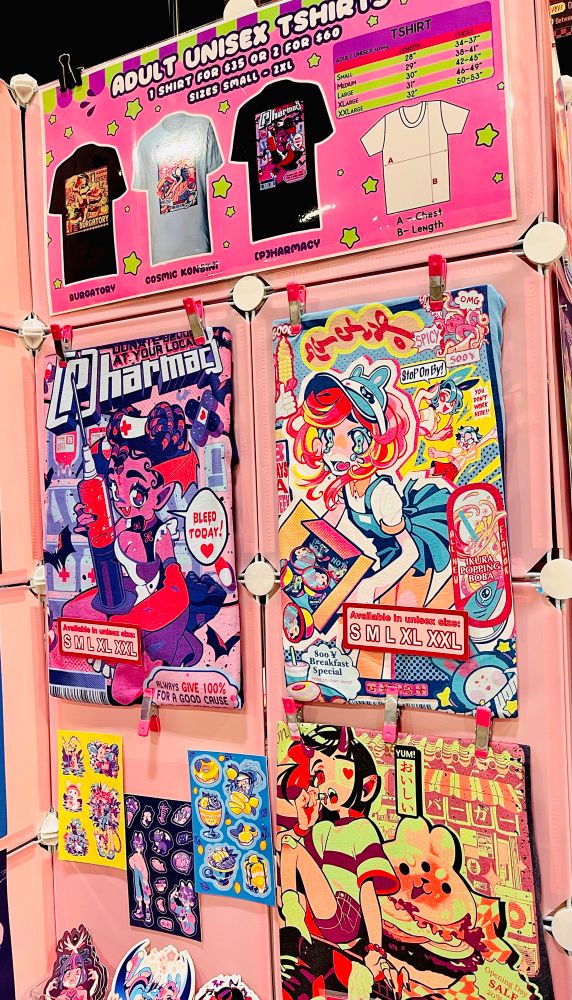 Close up of my table display featuring my tshirt designs 