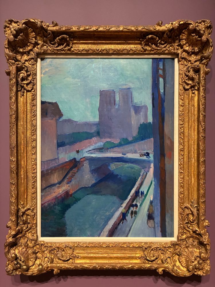 Painting by Matisse of Notre Dame and the Seine, in an abstracted geometric style, with large blocky areas of colour and a purple, green and blue palette 