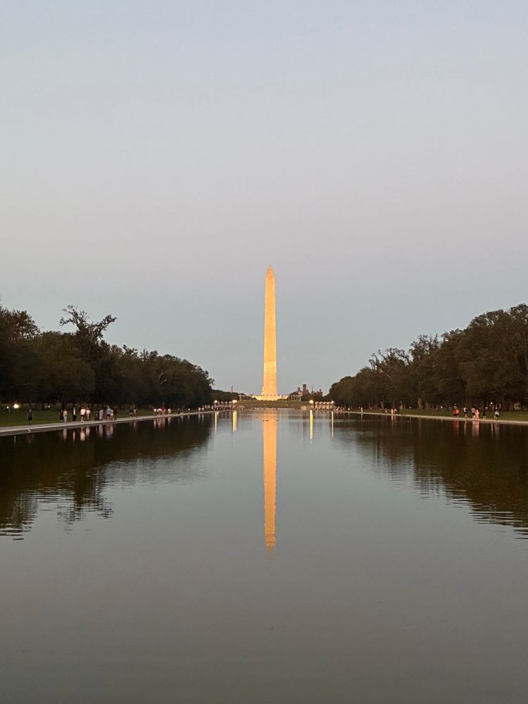 Image of Washington Monument, mirrored in the Reflecting Pool at sunset 