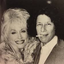 dolly parton snuggling up with a smoking fran lebowitz
