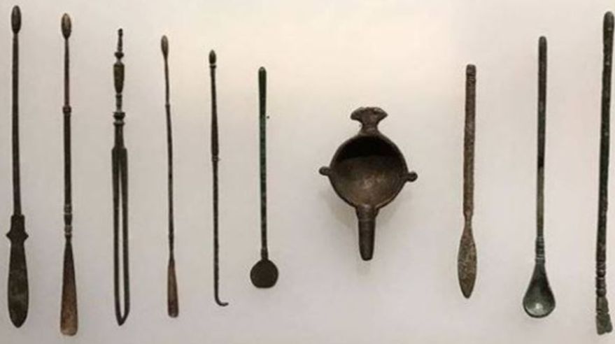A set of seven different-shaped surgical instruments