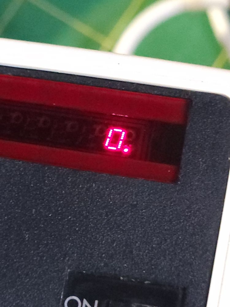 Commodore Minuteman 3 calculator display closeup.  Only one digit with zero is lit.