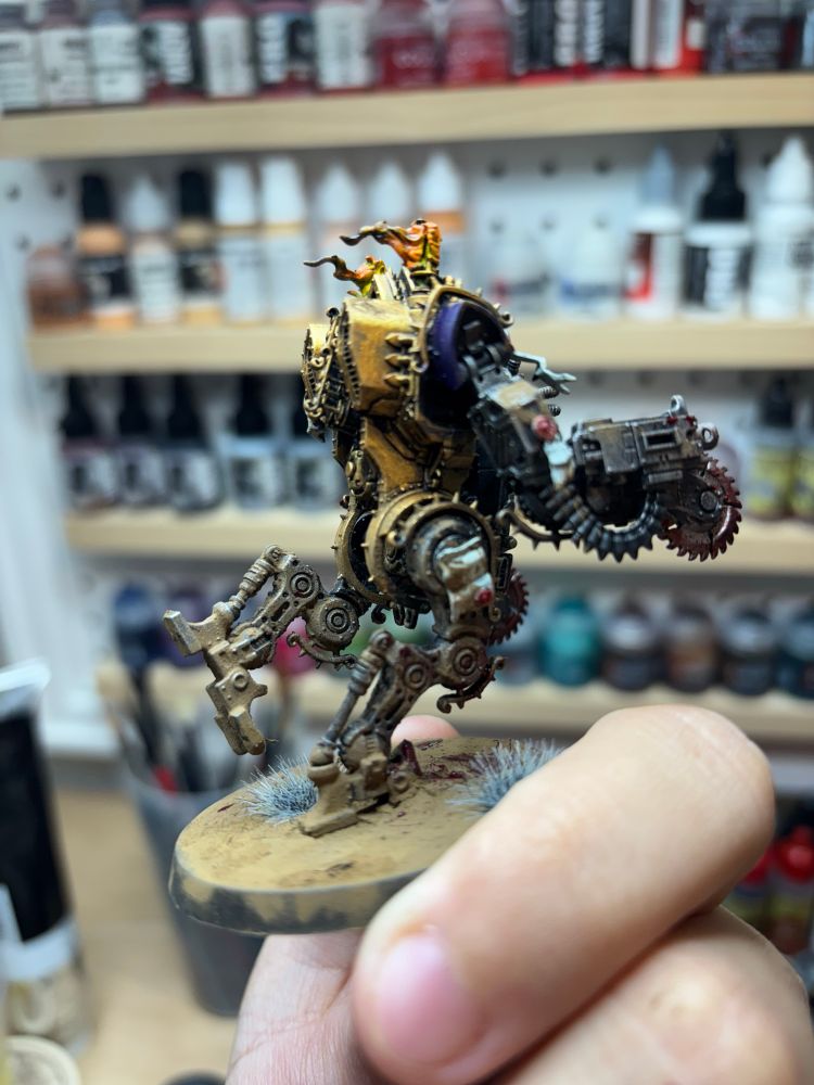 Purple and gold mortifiers with blood spatter and mud effects