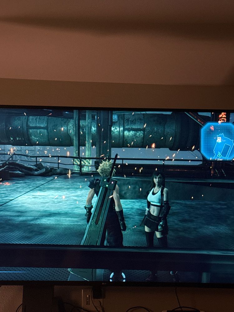 A photo of the video game Final Fantasy VII. This photo include the two protagonists, Cloud and Tifa. 