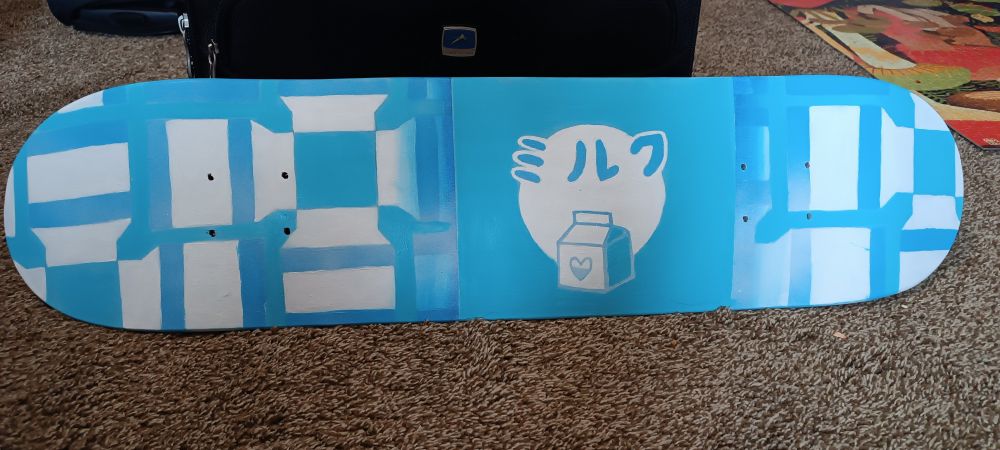Blue acrylic painting of milk on a skateboard