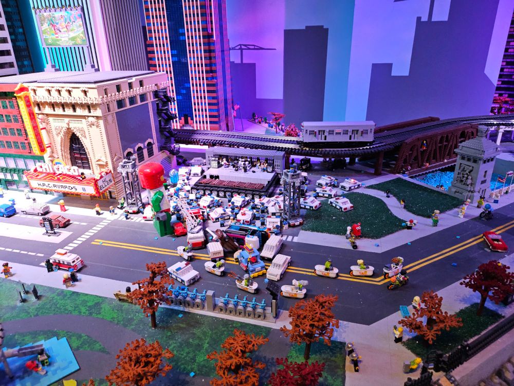 A lego display at Legoland of a lego Blues Brothers concert attended by way too many lego police cars.