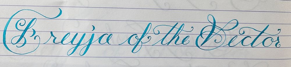 Needlepoint calligraphy in blue ink
Freyja of the Vector