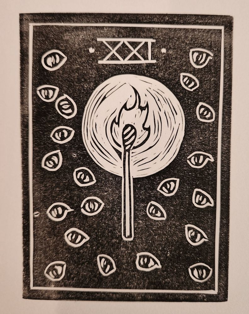 Linocut of a lit match surrounded by 21 eyeballs