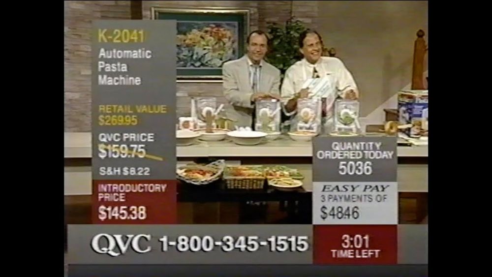 Screenshot of old QVC ad with two men selling an automatic pasta machine