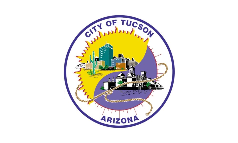 The flag of Tucson, Arizona. It is like a weird yin and yang baseball hybrid with the old and new, lots of lines, nothing inside of the lines, and a lasso?
