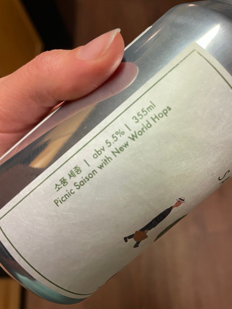 Side of the beer's label describing it as a Picnic Saison with New World Hops