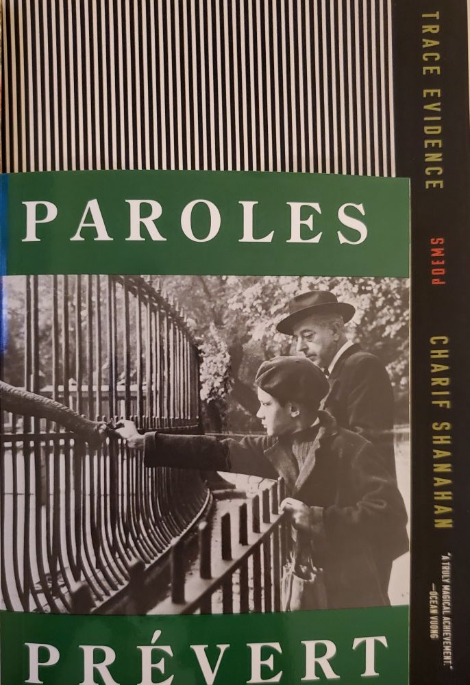 Cover of two books: Paroles by Prévert and Trace Evidence by Charif Shanahan.