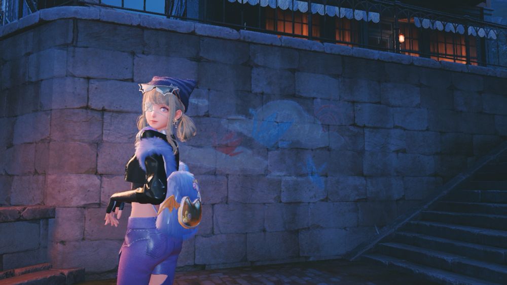 A girl stands in the same pose in front of some chalk graffiti in a town. She wears a black leather jacket, purple jeans, a striped purple beanie, and sunglasses perched on her head shaped like bat wings. She has a white medical eyepatch on her right eye and her hair is blonde and tied in two loops. On her back is a fuzzy purple backpack with orange bat wings. It is nighttime.