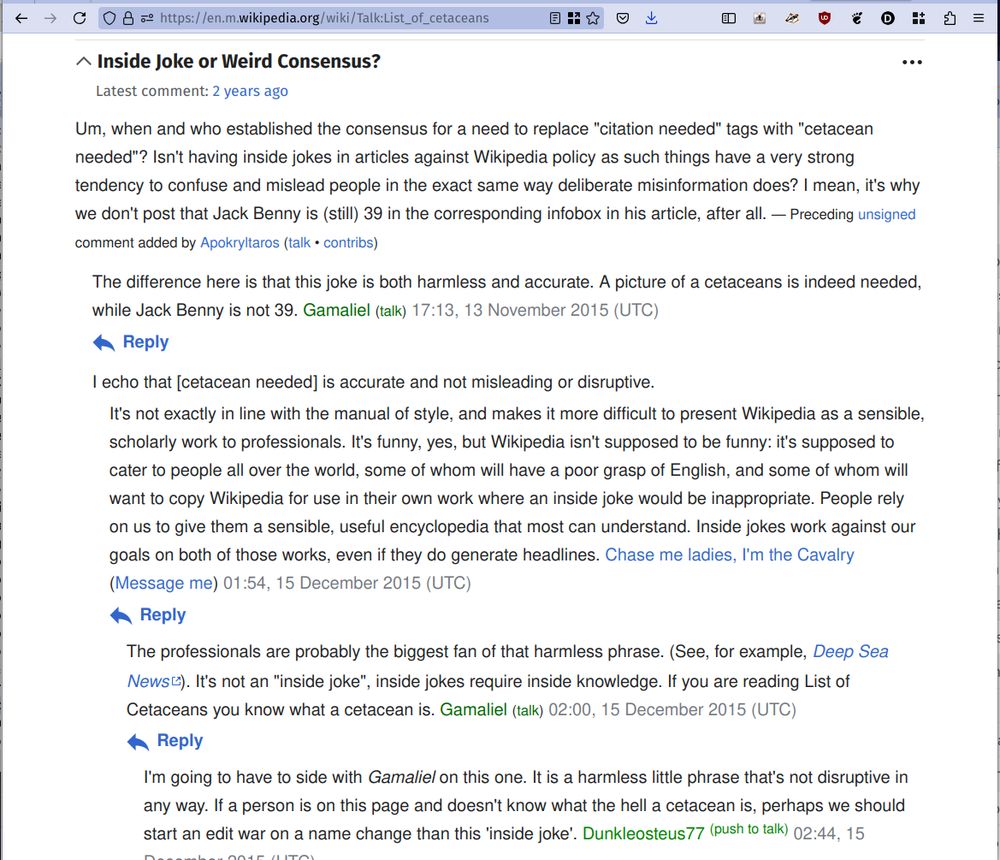 Screenshot from the Wikipedia talk page for "List of cetaceans" (https://en.m.wikipedia.org/wiki/Talk:List_of_cetaceans), showing past debates over the pun "[cetacean needed]".