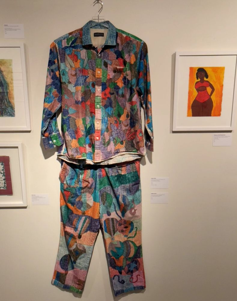 Artwork in the exhibition: Colourfully decorated shirt and trousers 