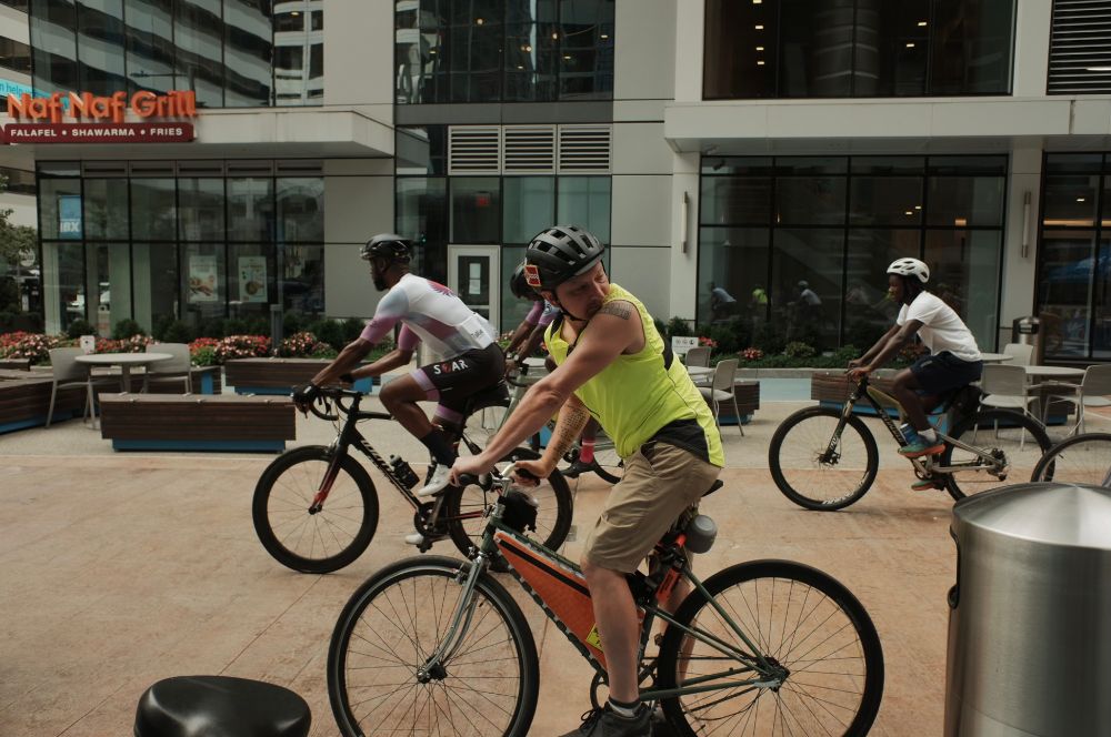 Me holding to watch the pack roll out so that I could sweep for a group bike ride this past Saturday morning.