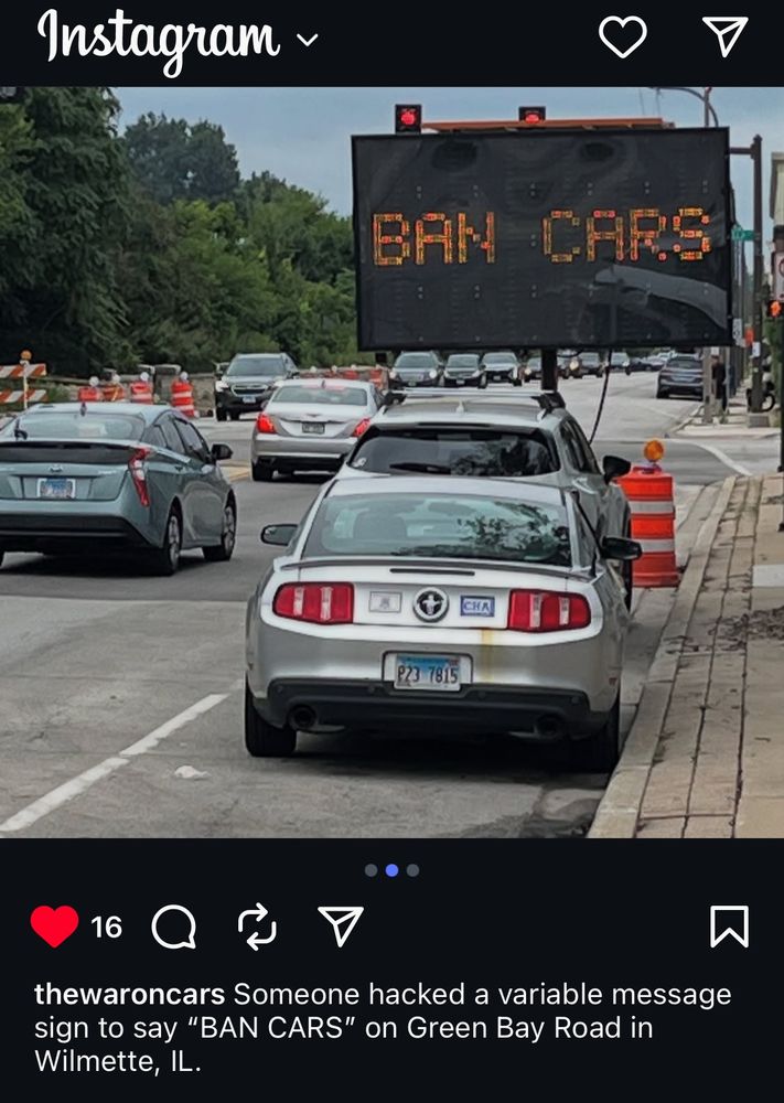 Screenshot of an instagram post. @thewaroncars’s caption covers the important parts: ‘Someone hacked a variable message sign to say 