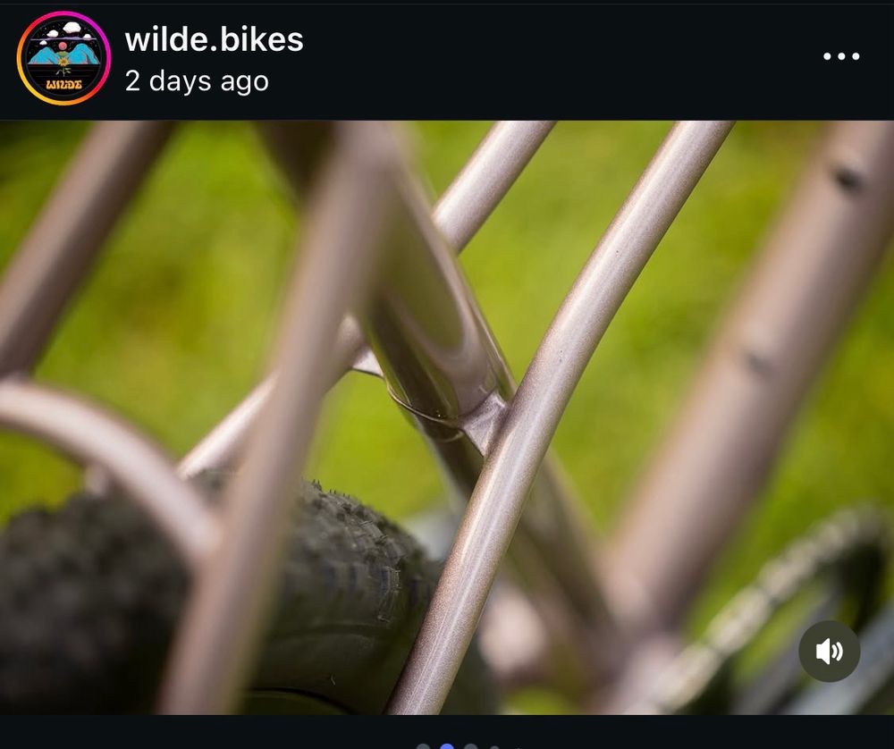 Wilde Bikes’s “Earth Seed”, detail of the seat tube, showing how the top tube is actually two narrow tubes splitting past the seat post and soldered to its sides to connect to the rear axle.