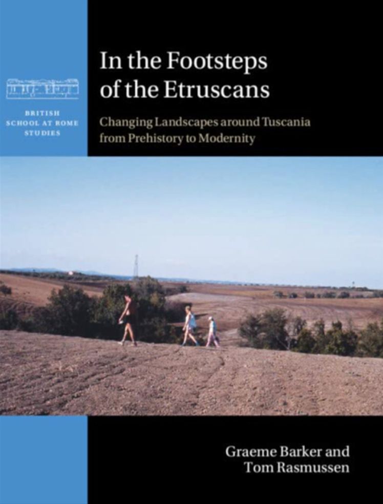 Book cover image, showing three people field walking in Tuscany.