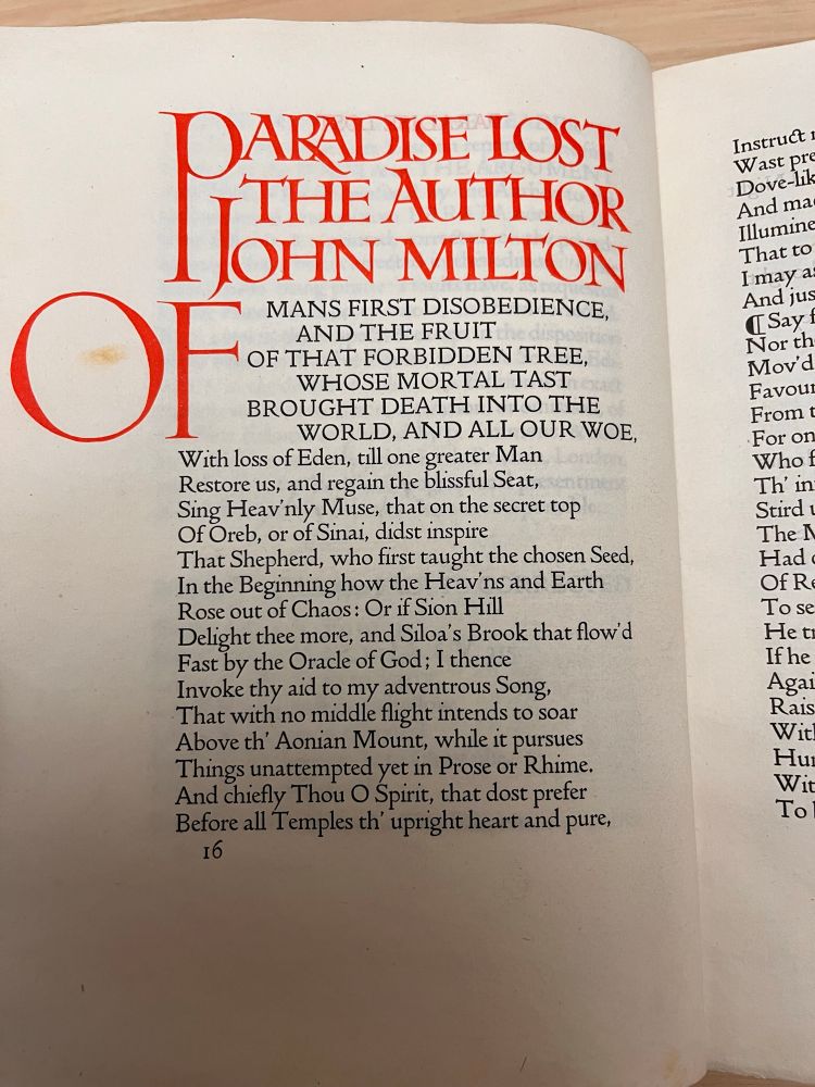 Opening page of Paradise Lost with large red lettering at the head. 