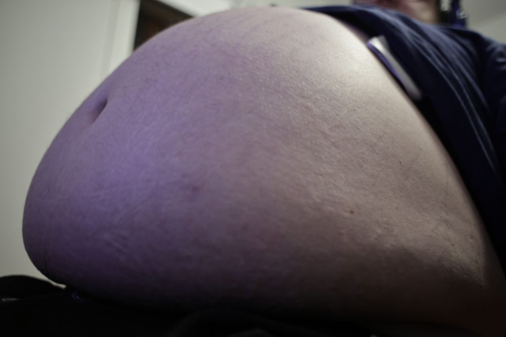A side-view of a fat belly 