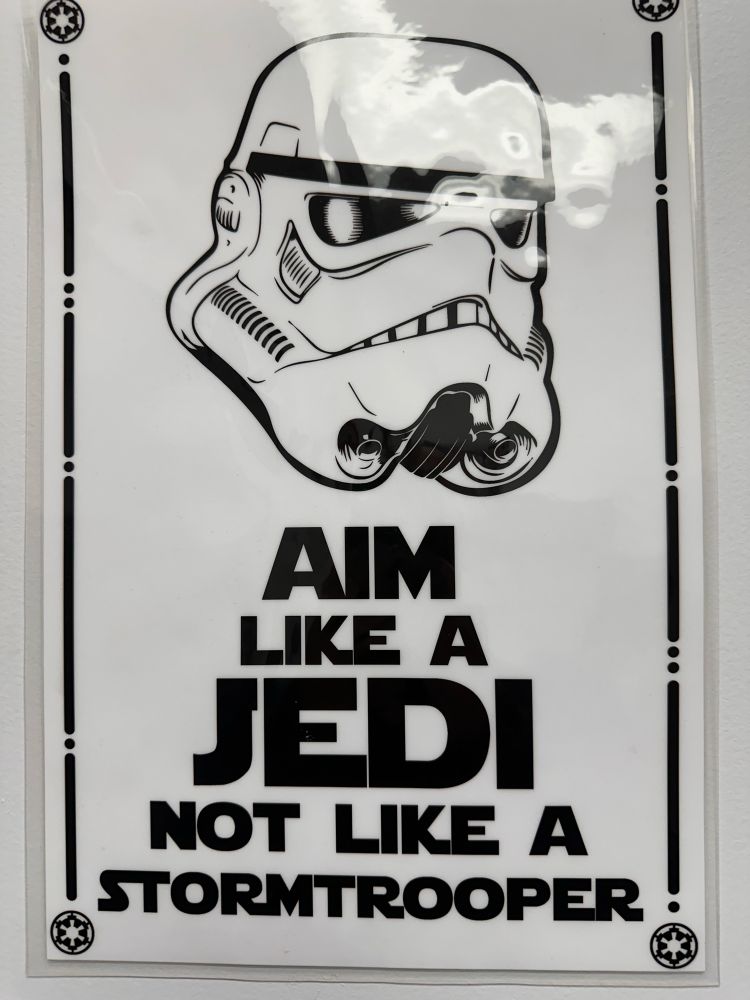 Aim like a Jedi not a stormtrooper sign in a men's room
