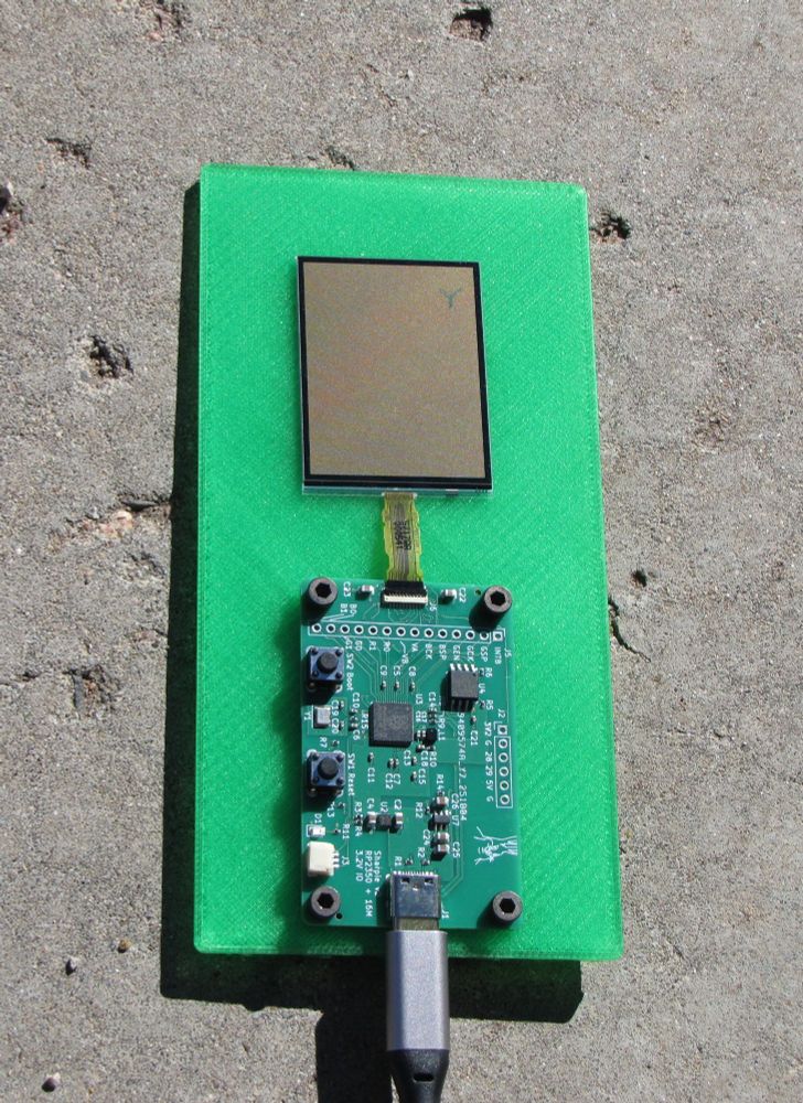 All images in this post show the Sharpie revision 2 development board and a 2.1 inch 64 color Sharp memory LCD showing a few different full-screen colors